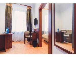 Łóżko lub łóżka w pokoju w obiekcie Hotel Chmielna Warsaw