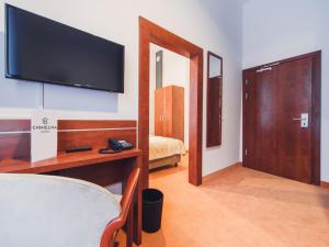 Łóżko lub łóżka w pokoju w obiekcie Hotel Chmielna Warsaw