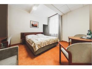 Łóżko lub łóżka w pokoju w obiekcie Hotel Chmielna Warsaw