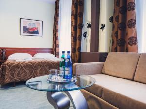 Łóżko lub łóżka w pokoju w obiekcie Hotel Chmielna Warsaw
