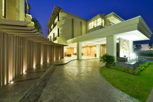 a large house with a walkway in front of it at Kacha Resort & Spa, Koh Chang in Ko Chang