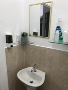 Een badkamer bij Hogar dulce hogar!