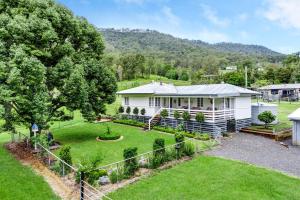 an aerial view of a house with a yard at The Cottage on Lamington in Canungra