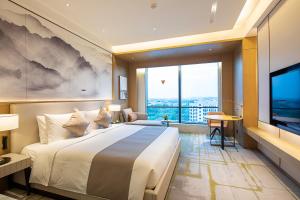 Postel nebo postele na pokoji v ubytování Metropark Hotel Hongqiao Shanghai