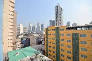 a view of a city with tall buildings at De Lux Bangkok Hotel in Ban Khlong Lat Bua Khao