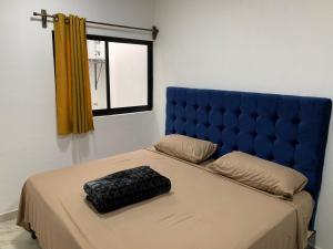 Un pat sau paturi într-o cameră la 4 Personas Vista al centro de la ciudad Tlaltenango 1z