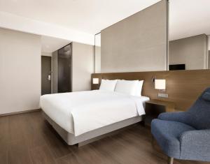 Postelja oz. postelje v sobi nastanitve Four Points by Sheraton Suwon