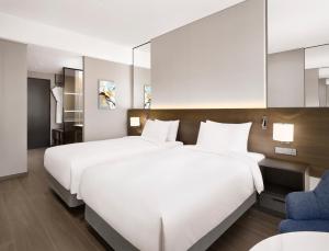 Postelja oz. postelje v sobi nastanitve Four Points by Sheraton Suwon