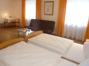 Postel nebo postele na pokoji v ubytování Garni Hotel Leitl GmbH