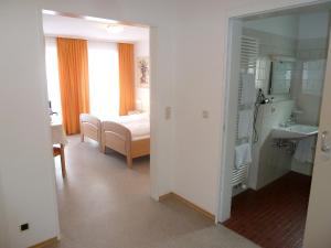 Postel nebo postele na pokoji v ubytování Garni Hotel Leitl GmbH