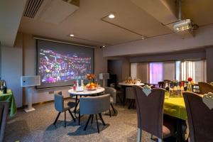TV o dispositivi per l'intrattenimento presso Cheng Jin Hotel