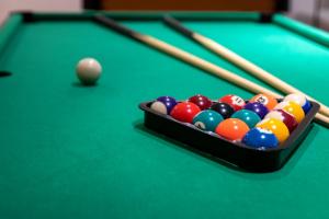 a set of pool balls on a pool table at Cheng Jin Hotel in Huangshan Scenic Area