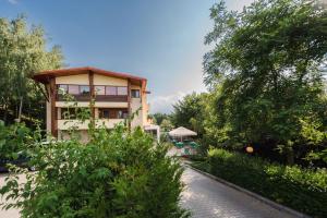 a house in the middle of a garden at La Mesteceni & Loc cu Stări de Bine, SPA adult only in Sălicea