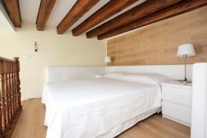 Posteľ alebo postele v izbe v ubytovaní City Apartments Rialto Market