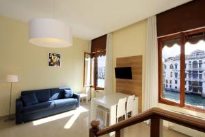 Televízia a/alebo spoločenská miestnosť v ubytovaní City Apartments Rialto Market