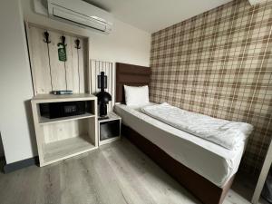 Кровать или кровати в номере Hotel Innception