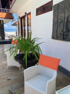 Balkón nebo terasa v ubytování Villa Agung Beach Inn