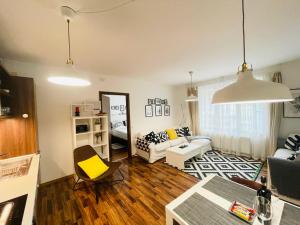Posteľ alebo postele v izbe v ubytovaní Peony Székely Mihály Apartment - Free Garage