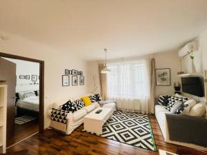 Posteľ alebo postele v izbe v ubytovaní Peony Székely Mihály Apartment - Free Garage