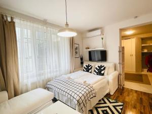 Posteľ alebo postele v izbe v ubytovaní Peony Székely Mihály Apartment - Free Garage
