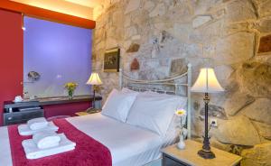 Postel nebo postele na pokoji v ubytování Mistral Hotel - For Solo Travelers