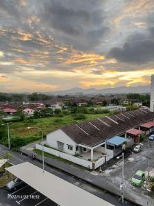 a view of a building with a parking lot at Casa Klebang Homestay in Ipoh
