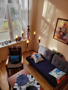 Posedenie v ubytovaní Apartament nad Parsętą w centrum - prywatne miejsce postojowe & dwa rowery