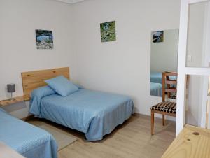 Postel nebo postele na pokoji v ubytování La Casa del Limonero