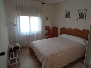 Postel nebo postele na pokoji v ubytování La Casa del Limonero