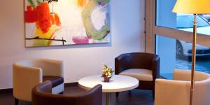 Posezení v ubytování BRIT HOTEL Confort Le Limouzi TULLE