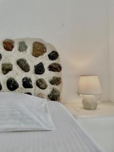 Een bed of bedden in een kamer bij Villa Maina