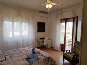 Posteľ alebo postele v izbe v ubytovaní CASA CAMELIA
