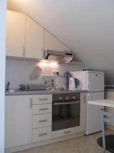 Apartments Marlais tesisinde mutfak veya mini mutfak