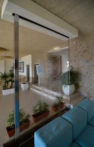 Posezení v ubytování Hotel Arenella