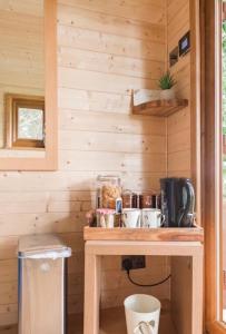 a wooden cabin with a counter in a room at The hideaway in Bristol