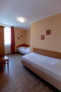 Postel nebo postele na pokoji v ubytování Villa-Senta-Apartment-7