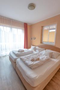 Postel nebo postele na pokoji v ubytování Villa-Senta-Apartment-12