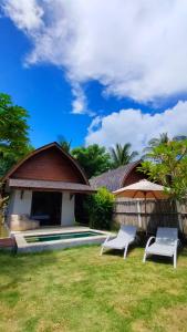 Zahrada ubytování The Club Villas Lombok