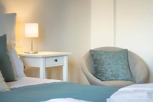 A bed or beds in a room at enJoy Home - Attico con idromassaggio e garage - zona Sant'Antonio