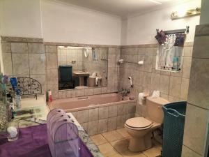 Ванная комната в Garden Cottage Guest House +32 фотографии