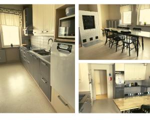 een keuken met witte kasten en een tafel met stoelen bij Easy Huoneistot Vierumäki in Härkälä