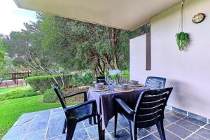 a table and chairs on a patio at Estate Lifestyle+Inverter+Wi-Fi in Roodepoort