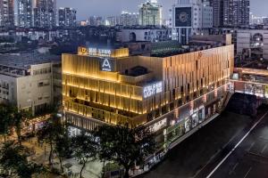 a rendering of a building in a city at night at Atour Light Hotel Guangzhou Zhujiang New Town Wuyangtun in Guangzhou