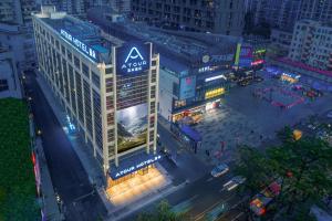 an overhead view of a large building in a city at night at Atour Hotel, Haizhu Jiangtai Road Subway Station, Guangzhou-Free shuttle bus service at the Canton Fair in Guangzhou