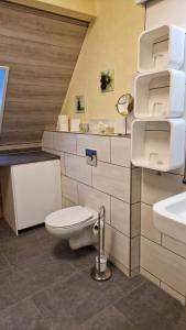Koupelna v ubytování Apartmenthaus in Walle