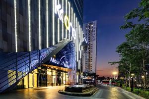 a building with a sign on the side of it at Atour S Hotel Binhe Times Shenzhen in Shenzhen