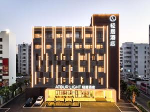 a rendering of the front of the arrow light hotel at Atour Hotel Zhuhai Gongbei Port Fuhuali CBD in Zhuhai