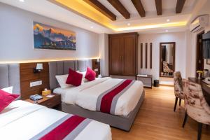 Posteľ alebo postele v izbe v ubytovaní Hotel Ama-La, Thamel, Kathmandu