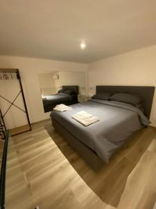 Postel nebo postele na pokoji v ubytování Visavi' Luxury Room