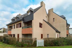 an old house with a gambrel roof at Ty Menez - Proche plage pour 4 in Bénodet